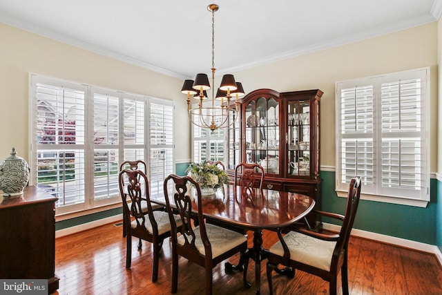 43 Triple Crown Dr Unit 441, Taneytown, MD 21787 - dining space with a chandelier, wood finished floors, baseboards, and ornamental molding