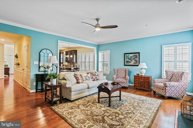 43 Triple Crown Dr Unit 441, Taneytown, MD 21787 - living area featuring ceiling fan, crown molding, plenty of natural light, wood finished floors, and baseboards