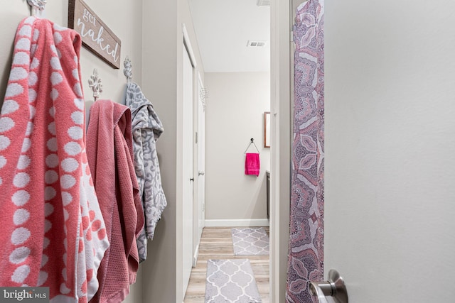 70302 Delaire Landing Rd Unit 302, Philadelphia, PA 19114 - bathroom with wood finished floors and baseboards