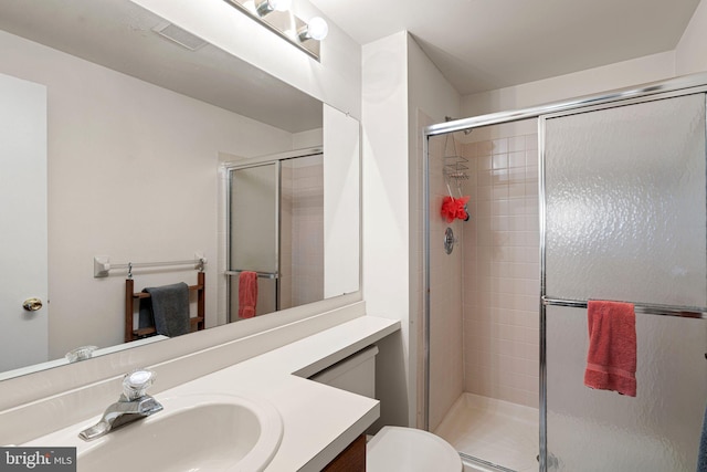 70302 Delaire Landing Rd Unit 302, Philadelphia, PA 19114 - full bathroom with vanity, a stall shower, and toilet