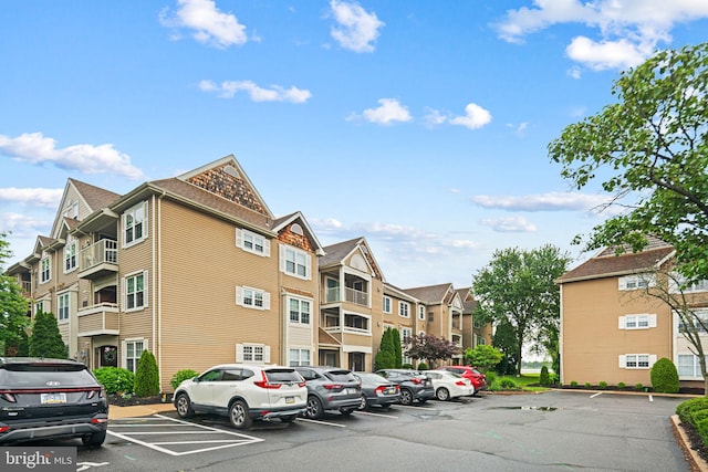 70302 Delaire Landing Rd Unit 302, Philadelphia, PA 19114 - view of property featuring uncovered parking