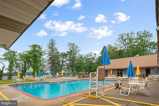 70302 Delaire Landing Rd Unit 302, Philadelphia, PA 19114 - community pool with a patio area