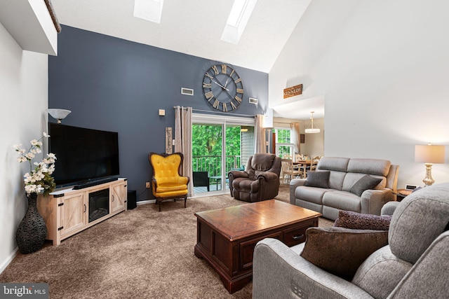 70302 Delaire Landing Rd Unit 302, Philadelphia, PA 19114 - living room with high vaulted ceiling, a skylight, carpet, and baseboards