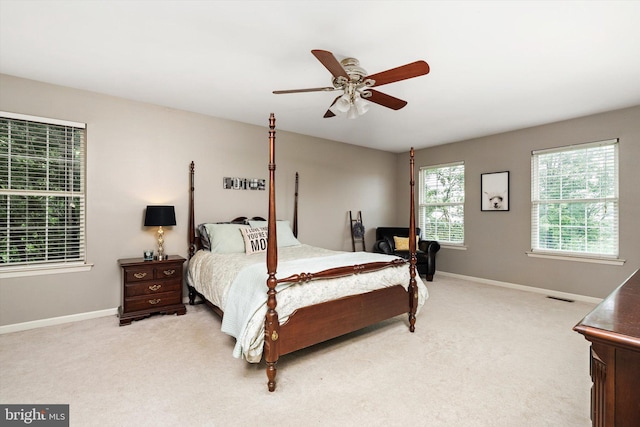 124 Kirschling Dr, Woolwich Twp, NJ 08085 - bedroom with light colored carpet, baseboards, and a ceiling fan