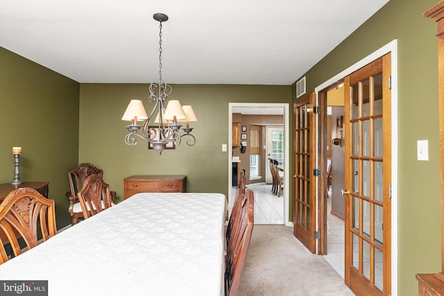124 Kirschling Dr, Woolwich Twp, NJ 08085 - carpeted dining space with a chandelier