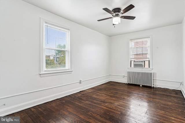 2425 E St NE, Washington, DC 20002 - empty room featuring radiator, hardwood / wood-style floors, cooling unit, and baseboards