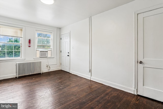 2425 E St NE, Washington, DC 20002 - entryway with radiator, dark wood finished floors, and baseboards