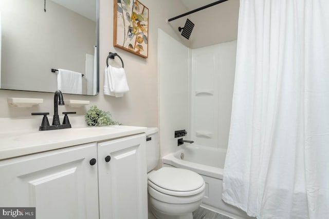 3548 Mcshane Way, Dundalk, MD 21222 - bathroom featuring toilet, shower / bath combo, and vanity