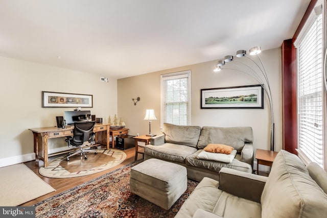 2725 Ordway St NW Unit 2, Washington, DC 20008 - living area with an office area, wood finished floors, and baseboards