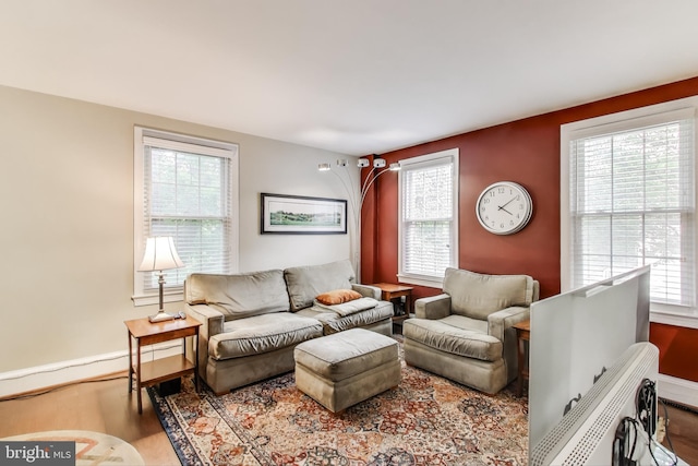 2725 Ordway St NW Unit 2, Washington, DC 20008 - living room with wood finished floors, plenty of natural light, and baseboards