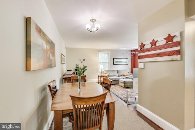 2725 Ordway St NW Unit 2, Washington, DC 20008 - dining space with baseboards and wood finished floors