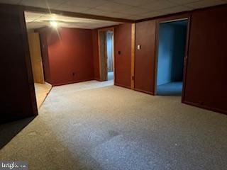 7686 Briar Ln, Pasadena, MD 21122 - finished below grade area featuring a drop ceiling and light carpet