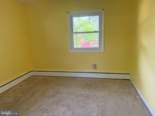 7686 Briar Ln, Pasadena, MD 21122 - carpeted spare room with baseboards
