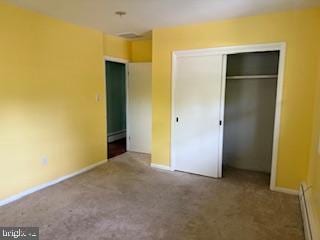 7686 Briar Ln, Pasadena, MD 21122 - unfurnished bedroom with carpet flooring, a closet, and baseboards
