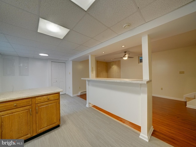 9407 7th St N, Laurel, MD 20723 - bar area with light wood finished floors, baseboards, ceiling fan, a drop ceiling, and recessed lighting