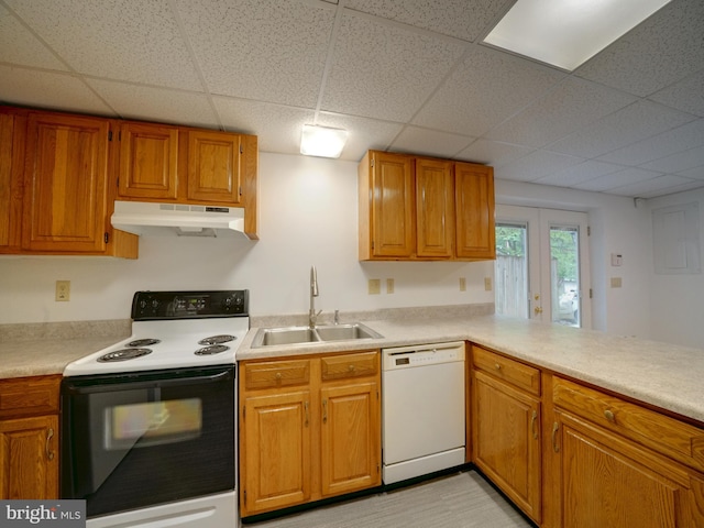 9407 7th St N, Laurel, MD 20723 - kitchen featuring dishwasher, electric stove, under cabinet range hood, a sink, and a paneled ceiling
