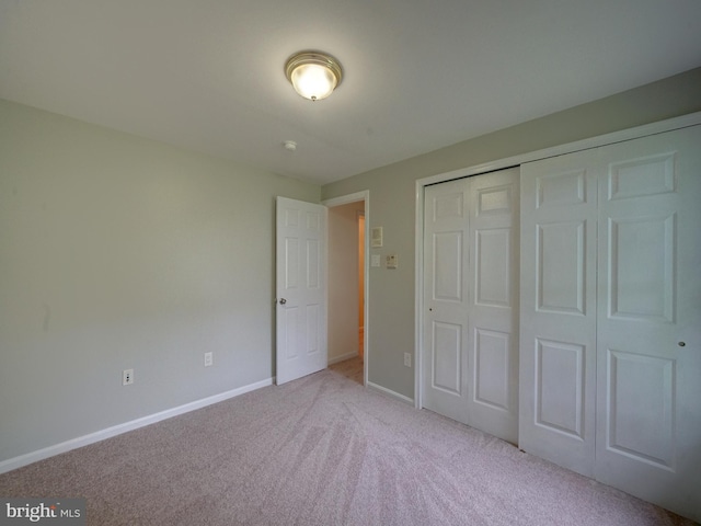 9407 7th St N, Laurel, MD 20723 - unfurnished bedroom with carpet floors, baseboards, and a closet