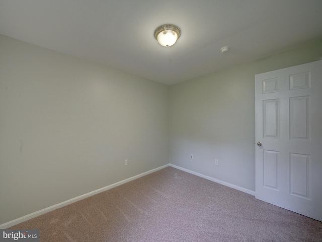 9407 7th St N, Laurel, MD 20723 - carpeted empty room featuring baseboards and a smoke detector