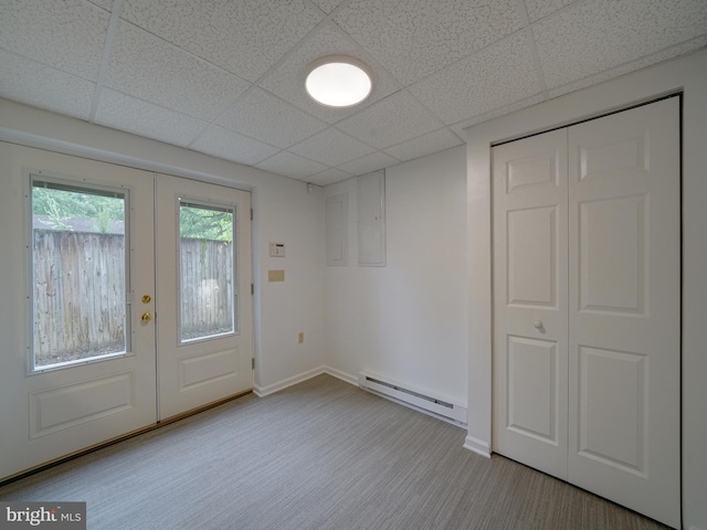 9407 7th St N, Laurel, MD 20723 - carpeted entryway with a baseboard radiator, french doors, a paneled ceiling, and baseboards