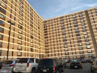 4600 Duke St Unit 1208, Alexandria, VA 22304 - view of property with uncovered parking