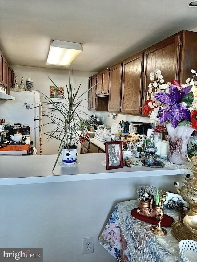 4600 Duke St Unit 1208, Alexandria, VA 22304 - kitchen featuring under cabinet range hood