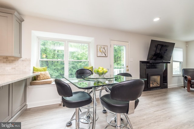 256 Rock Run Rd, Yardley, PA 19067 - dining room with a fireplace, light wood finished floors, baseboards, and recessed lighting