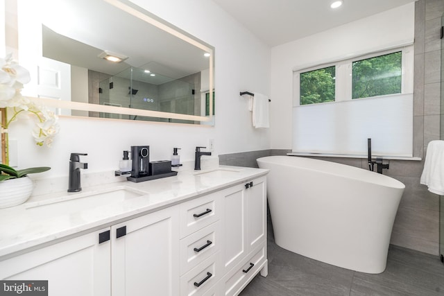 256 Rock Run Rd, Yardley, PA 19067 - bathroom featuring tiled shower, double vanity, a freestanding tub, tile patterned floors, and recessed lighting
