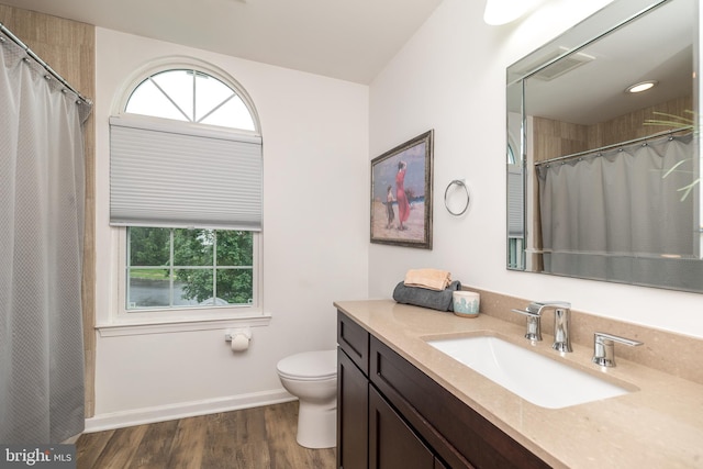 256 Rock Run Rd, Yardley, PA 19067 - full bath featuring toilet, vanity, wood finished floors, baseboards, and a shower with curtain
