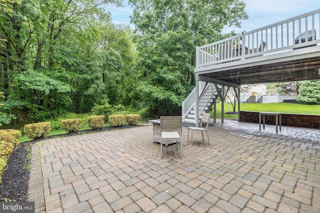 256 Rock Run Rd, Yardley, PA 19067 - view of patio with stairs, outdoor dining area, and a wooden deck