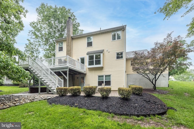 256 Rock Run Rd, Yardley, PA 19067 - back of property featuring stairway, a lawn, a wooden deck, and a chimney