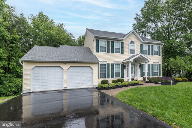 256 Rock Run Rd, Yardley, PA 19067 - colonial inspired home with asphalt driveway, an attached garage, a front lawn, and a shingled roof