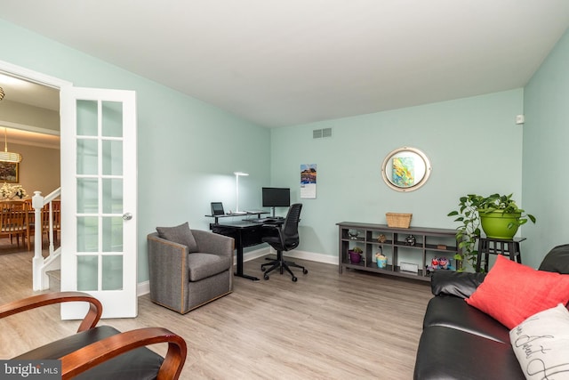 256 Rock Run Rd, Yardley, PA 19067 - home office featuring wood finished floors, baseboards, and french doors