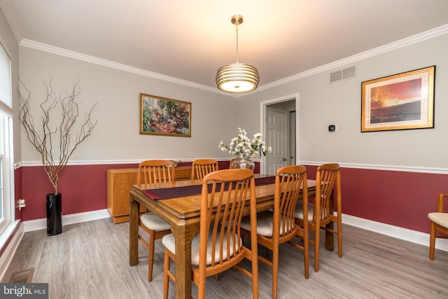 256 Rock Run Rd, Yardley, PA 19067 - dining area featuring light wood finished floors, crown molding, and baseboards