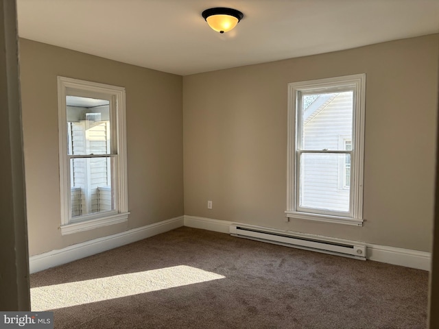 203 4th Ave, Burnham, PA 17009 - carpeted empty room with a baseboard radiator and baseboards