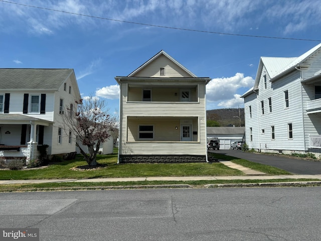 203 4th Ave, Burnham, PA 17009 - view of front facade with a front yard
