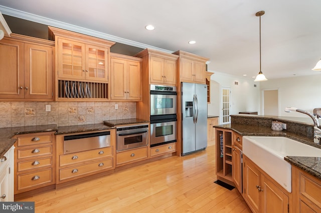 148 Lawn Rd, Palmyra, PA 17078 - kitchen with appliances with stainless steel finishes, a warming drawer, a sink, ornamental molding, and decorative light fixtures