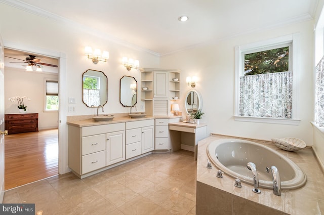 148 Lawn Rd, Palmyra, PA 17078 - bathroom featuring vanity, crown molding, a tub with jets, ceiling fan, and tile patterned flooring