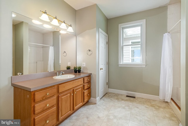 148 Lawn Rd, Palmyra, PA 17078 - full bathroom featuring vanity, a shower with shower curtain, and baseboards