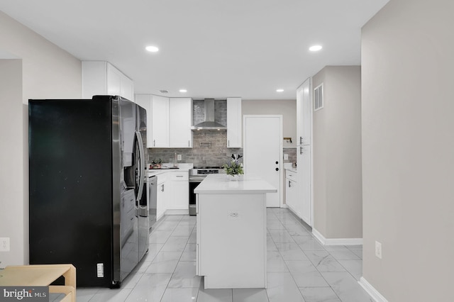 14901 Running Ridge Ln, Silver Spring, MD 20906 - kitchen with wall chimney range hood, stainless steel appliances, light marble finish flooring, light countertops, and recessed lighting