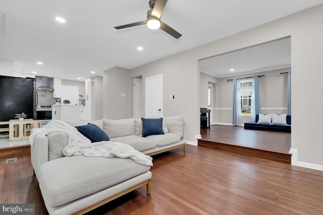 14901 Running Ridge Ln, Silver Spring, MD 20906 - living area with wood finished floors, a ceiling fan, recessed lighting, and baseboards