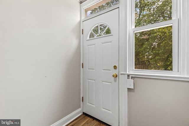 616 Hamilton St NW, Washington, DC 20011 - entryway featuring baseboards and dark wood-type flooring