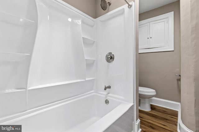 616 Hamilton St NW, Washington, DC 20011 - full bath featuring baseboards, toilet, wood finished floors, and shower / bath combination