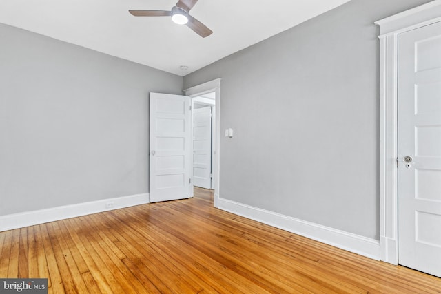 616 Hamilton St NW, Washington, DC 20011 - spare room with a ceiling fan, baseboards, and light wood-style flooring