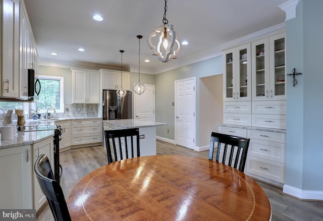 6224 Parkview Ct, Elkridge, MD 21075 - dining room with baseboards, crown molding, a chandelier, light wood finished floors, and recessed lighting