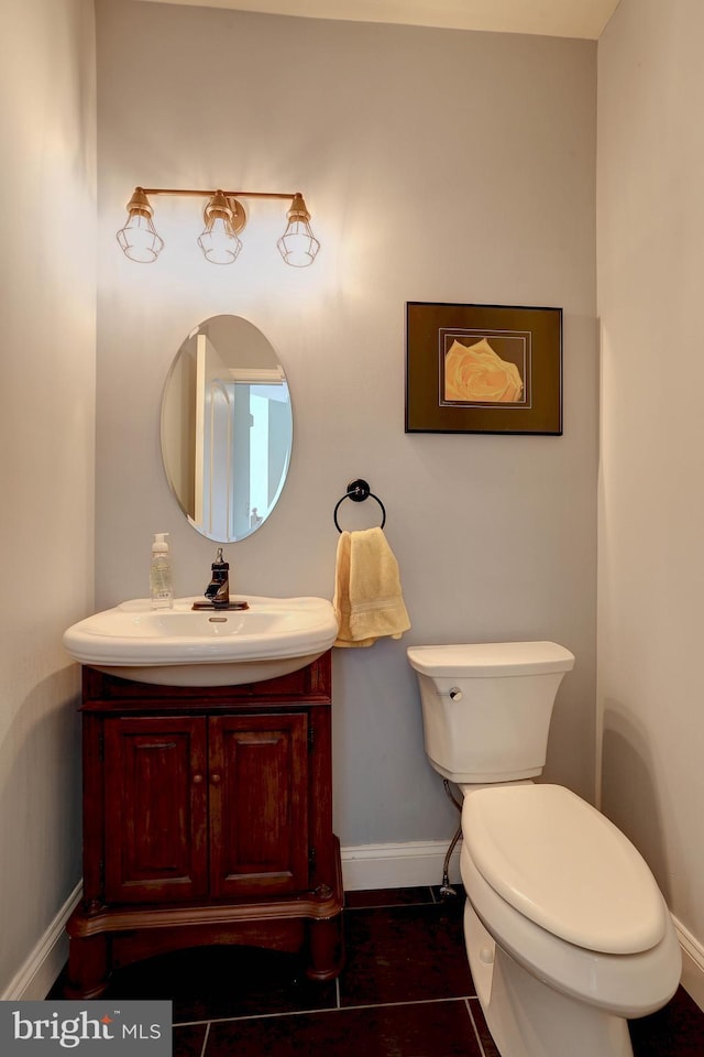 6224 Parkview Ct, Elkridge, MD 21075 - bathroom featuring baseboards, toilet, vanity, and tile patterned flooring