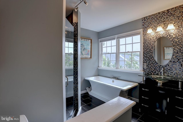 6224 Parkview Ct, Elkridge, MD 21075 - full bath with baseboards, a soaking tub, vanity, a stall shower, and tile patterned floors