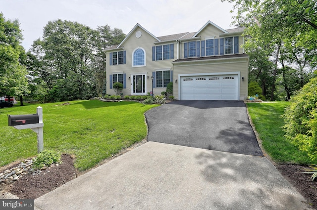 6224 Parkview Ct, Elkridge, MD 21075 - view of front facade with asphalt driveway, an attached garage, and a front yard
