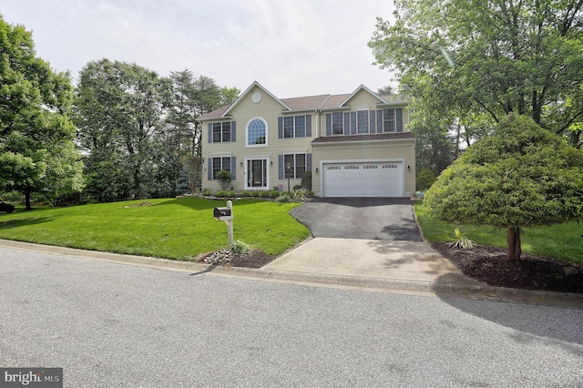 6224 Parkview Ct, Elkridge, MD 21075 - colonial inspired home featuring asphalt driveway, a front yard, and a garage