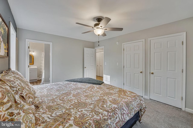 19446 Heather Ln, Orange, VA 22960 - carpeted bedroom featuring ceiling fan, multiple closets, ensuite bathroom, and baseboards