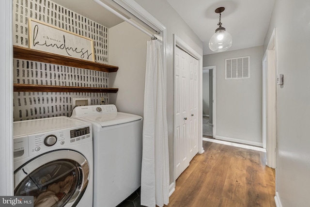19446 Heather Ln, Orange, VA 22960 - washroom with washer and clothes dryer, wood finished floors, and baseboards